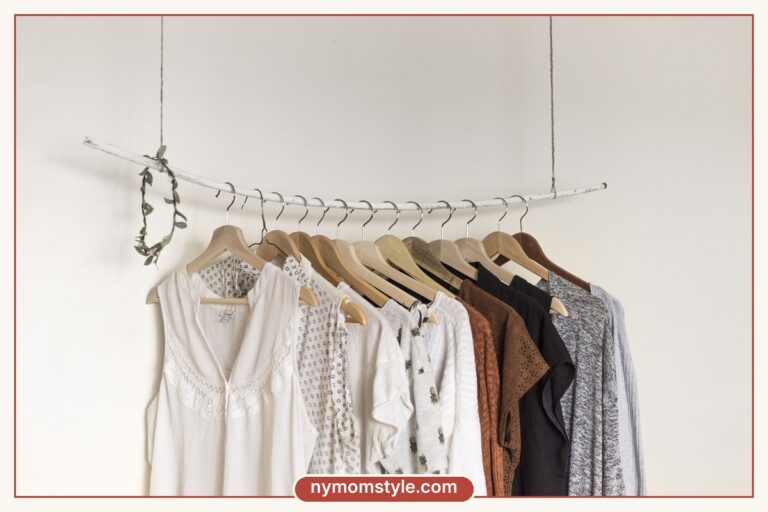 White and neutral clothes hanging on a minimal rail, a capsule wardrobe