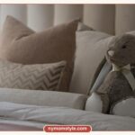 Beige and brown cushions on a neutral bed, a calm neutral colour palette