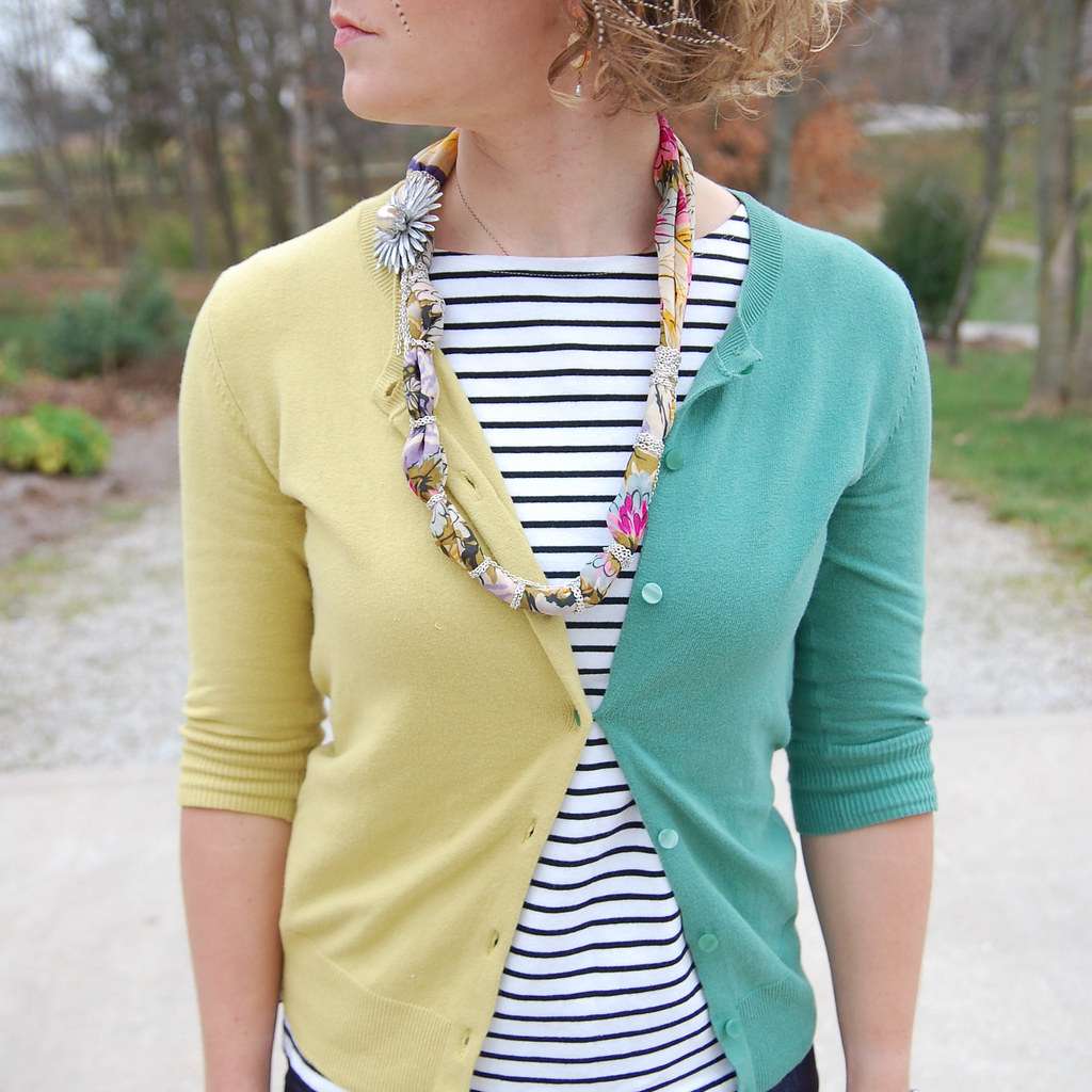 Yellow and teal cardigan over a striped tee, a simple layered outfit for stay-at-home moms